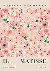 Een poster in vintage-stijl van CollageDepot met de titel "Papiers Découpés" en artiestennaam "H. Matisse" in vetgedrukte tekst, met een bloemmotief van roze en groen op een gebroken witte achtergrond. De tekst onderaan luidt: "École de Paris France 1890.-