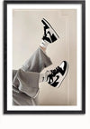 Een ingelijste foto van een persoon die met zijn voeten tegen de muur ligt, met een grijze broek, witte sokken en zwart-witte Nike Jordans aan. Dit unieke Nike Jordans Schilderij van CollageDepot geeft elke kamer een modern tintje.,Zwart-Met,Lichtbruin-Met,showOne,Met